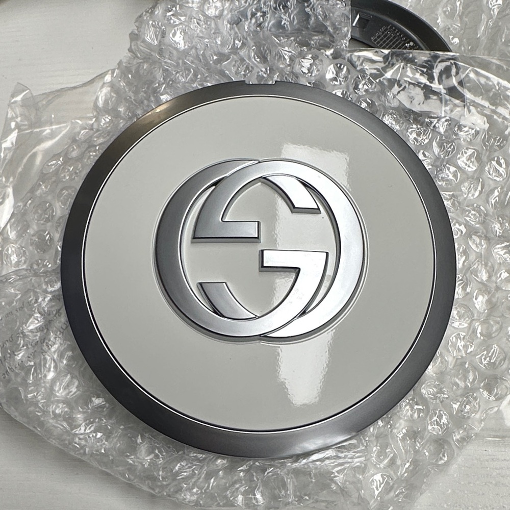Gucci White and Silver Wheel Center Caps.